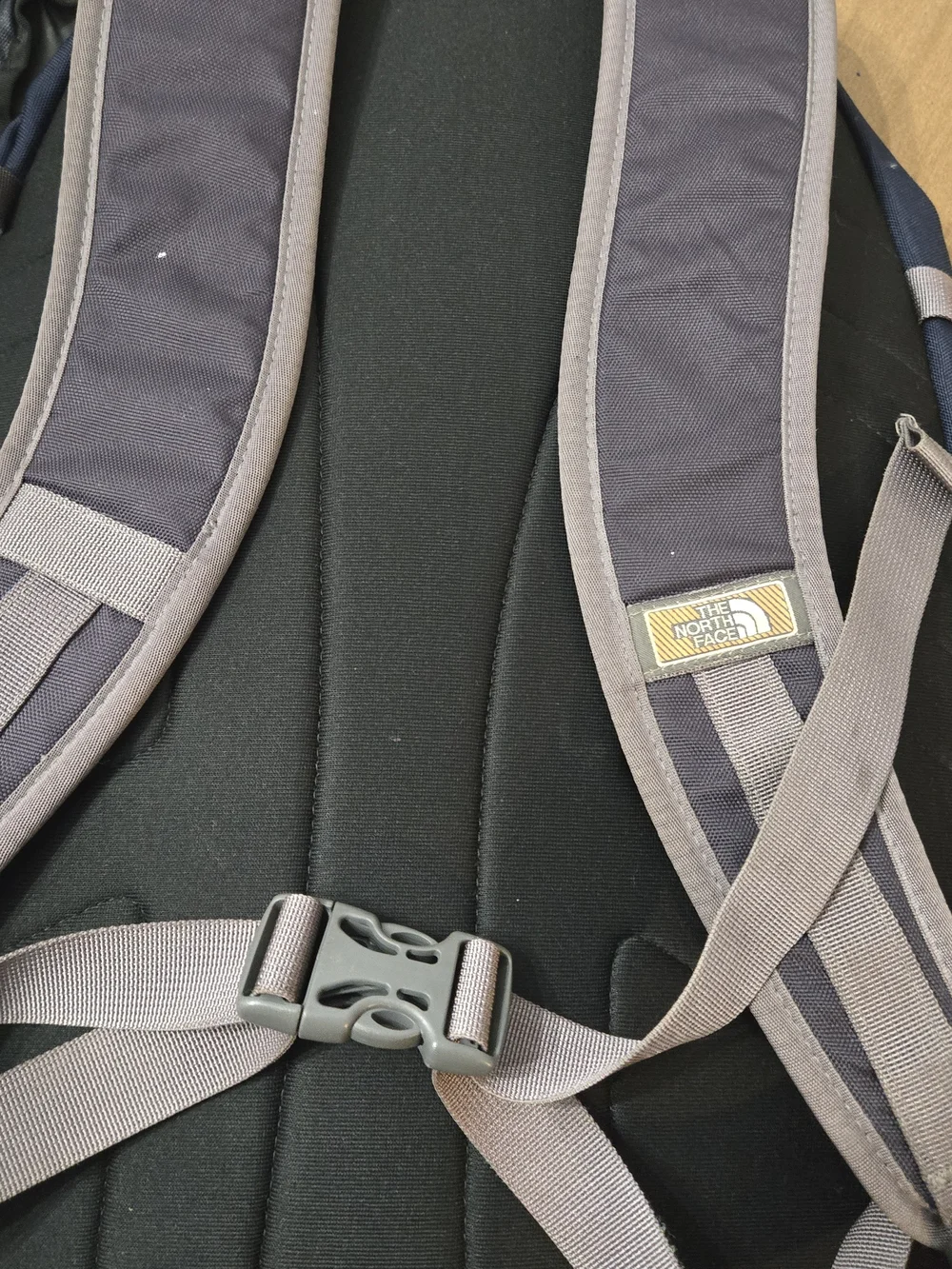 The North Face Slingshot Backpack in Navy and Charcoal